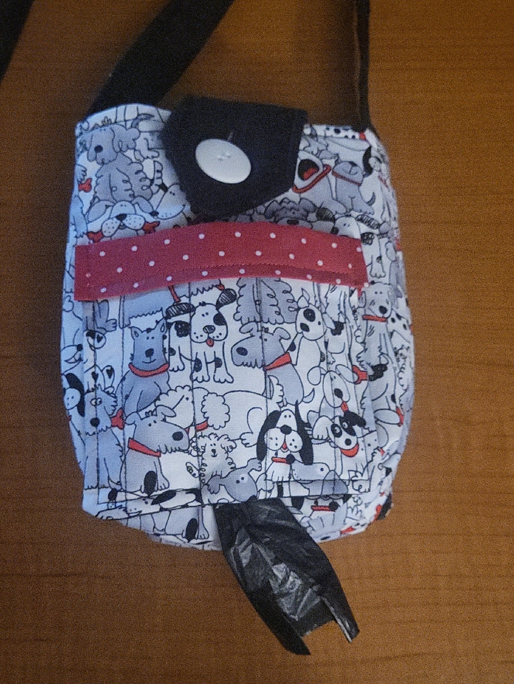 Hand Crafted Dog Print Crossbody Bag with Red Accents To Carry Poo Disposal Bag